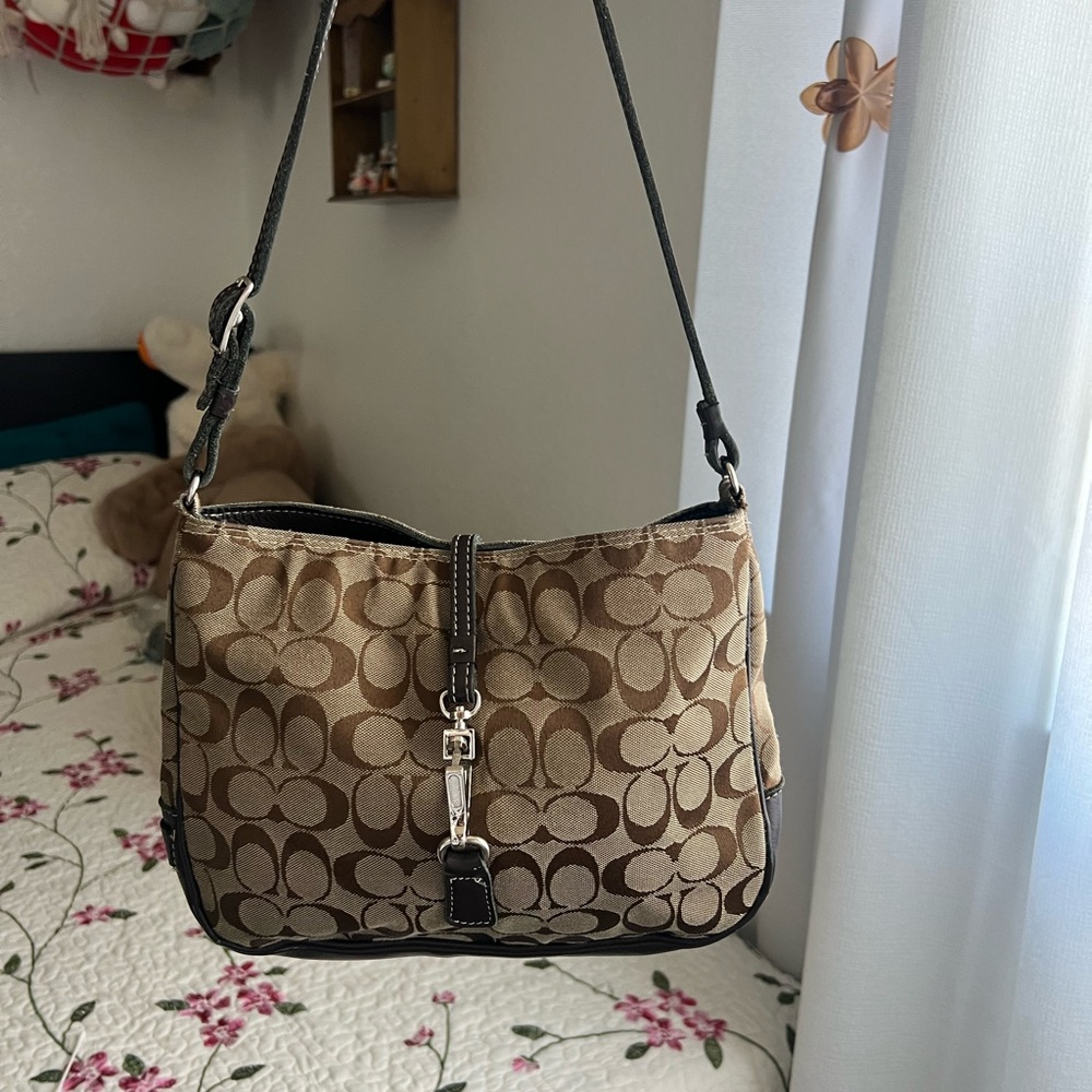 Available 
Tan and Brown Signature Shoulder Bag
